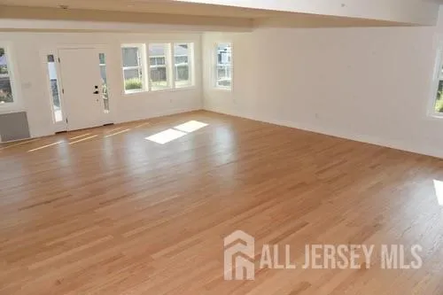 a room with a dresser and a mirror