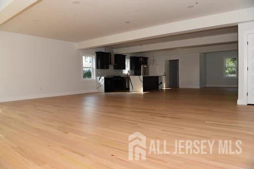 28 Plymouth Place Edison, NJ 08837 - Photo 4 of 33 wooden floor in a room