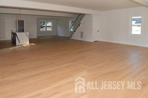 28 Plymouth Place Edison, NJ 08837 - Photo 6 of 33 a view of empty room with window and fireplace