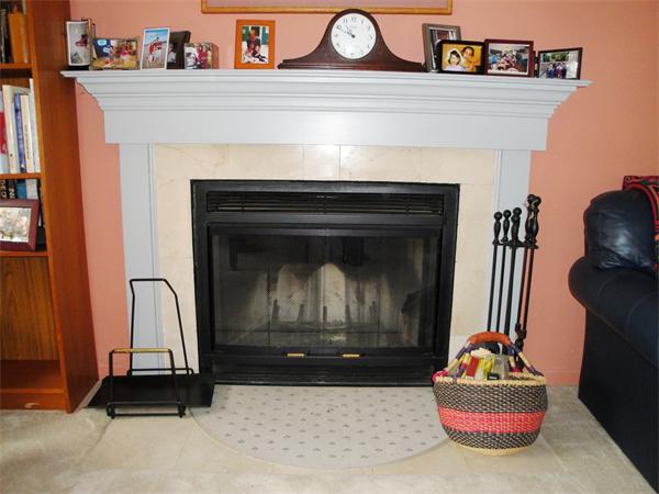 36 Byron Road Natick, MA 01760 - Photo 5 of 20 a living room with furniture and a fireplace