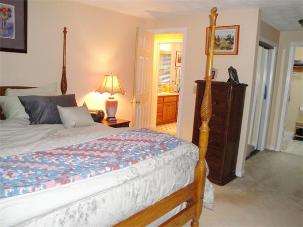 36 Byron Road Natick, MA 01760 - Photo 8 of 20 a bedroom with a bed and wooden floor