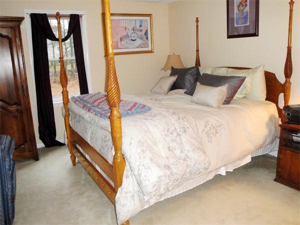 36 Byron Road Natick, MA 01760 - Photo 9 of 20 a bedroom with a bed and a walk in closet