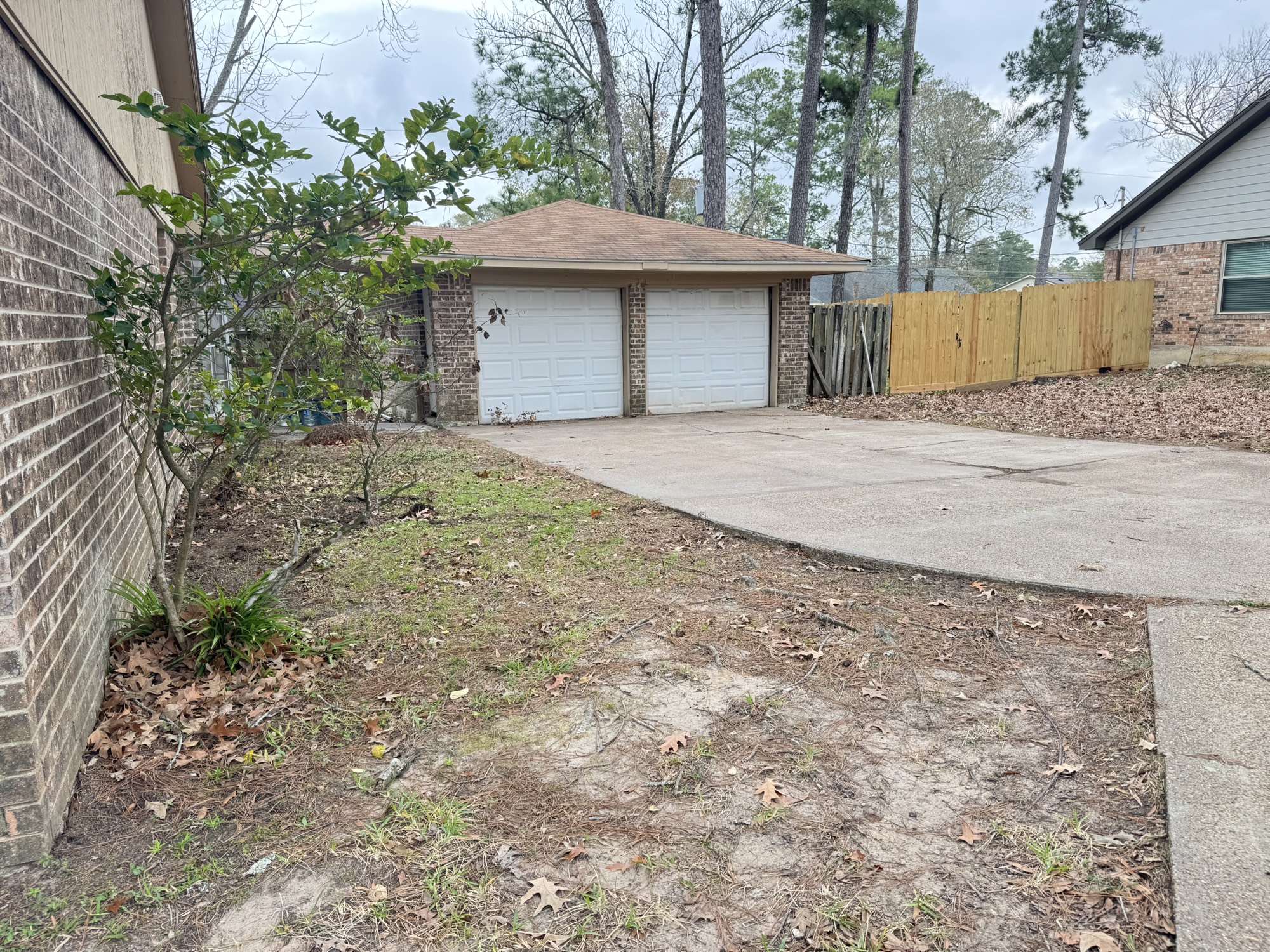 6214 Nowlin Drive Baytown, TX 77521 - Photo 3 of 12 a house view with a outdoor space