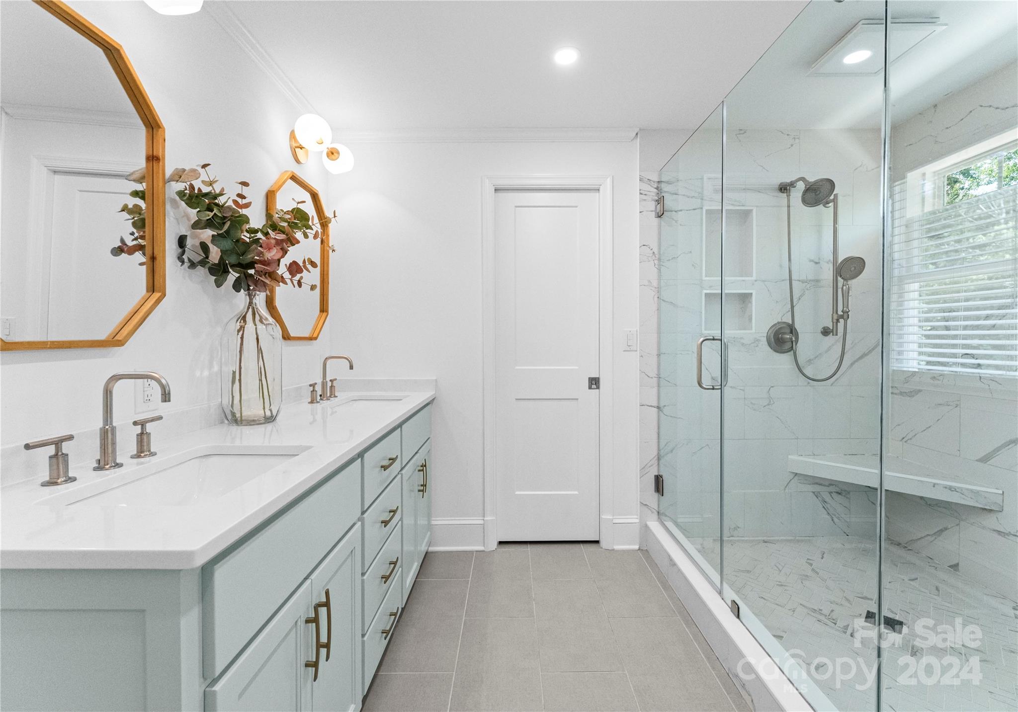 1108 Sedgefield Road Charlotte, NC 28209 - Photo 13 of 24 a bathroom with a double vanity sink mirror and shower