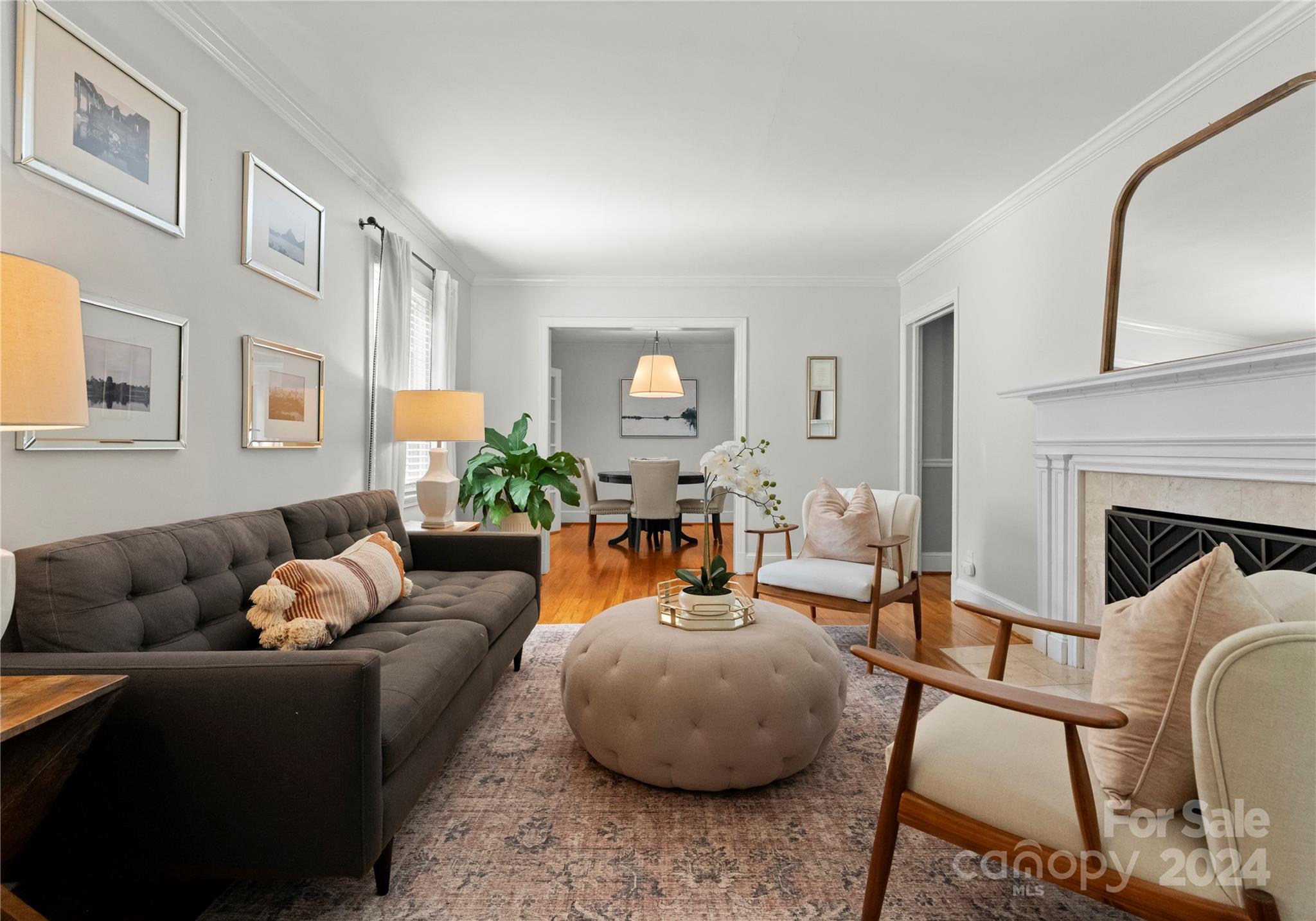 1108 Sedgefield Road Charlotte, NC 28209 - Photo 5 of 24 a living room with furniture and a fireplace