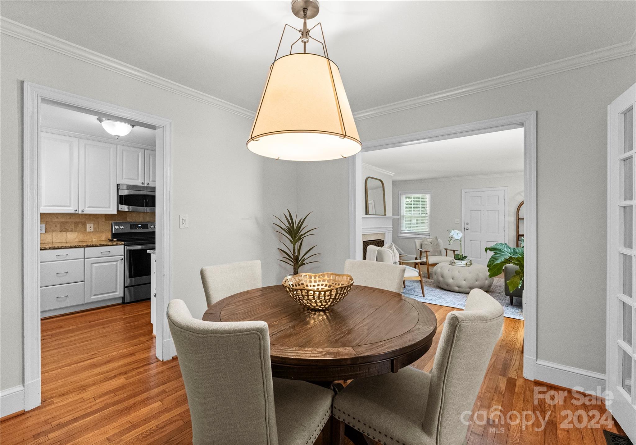 1108 Sedgefield Road Charlotte, NC 28209 - Photo 7 of 24 a view of a dining room with furniture and wooden floor