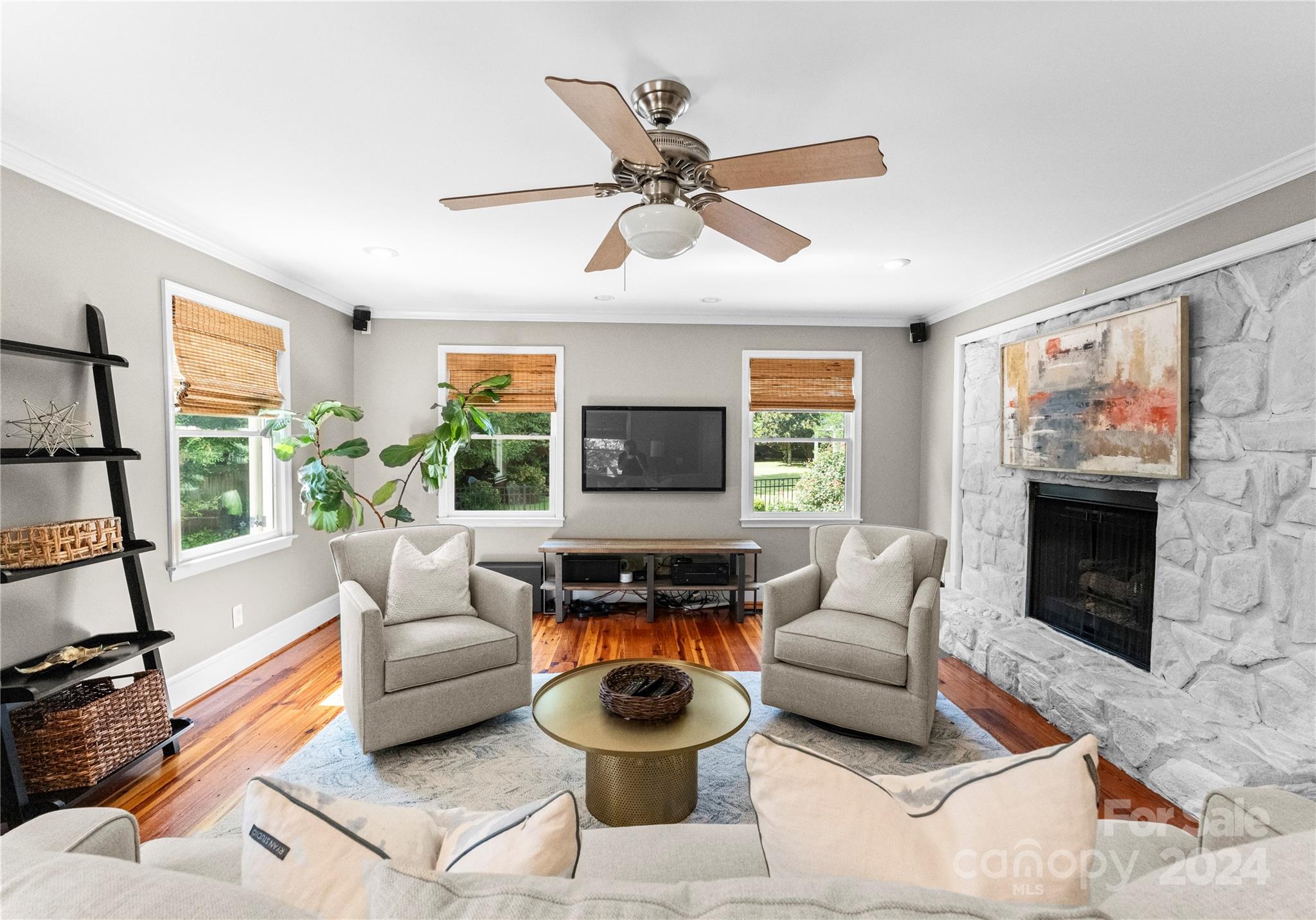 1108 Sedgefield Road Charlotte, NC 28209 - Photo 9 of 24 a living room with furniture a fireplace and a large window