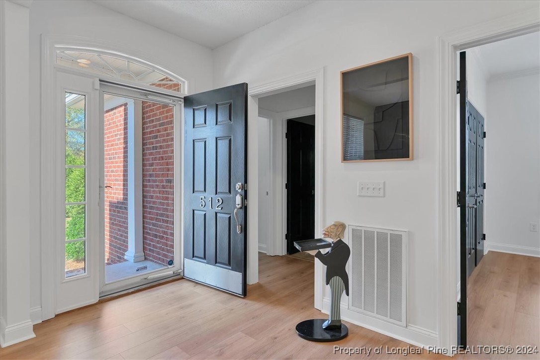 512 Maple Leaf Way Lumberton, NC 28358 - Photo 11 of 50 a view of a livingroom with furniture and a window