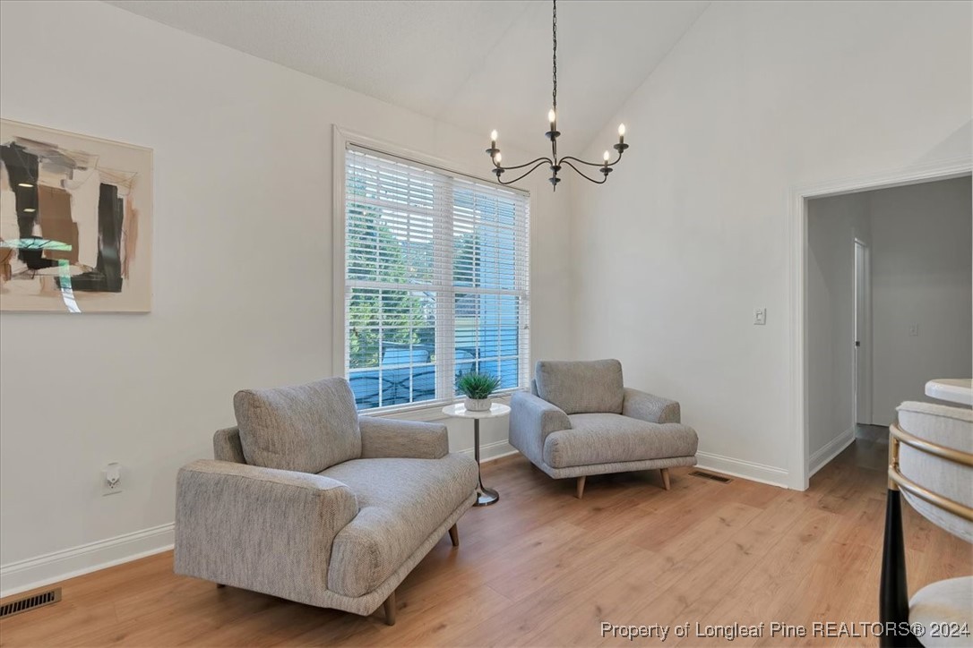 512 Maple Leaf Way Lumberton, NC 28358 - Photo 20 of 50 a living room with furniture and a large window