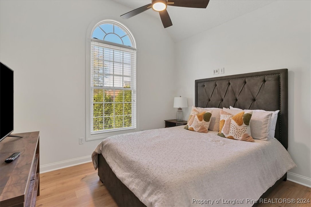 512 Maple Leaf Way Lumberton, NC 28358 - Photo 26 of 50 a bedroom with a bed and window
