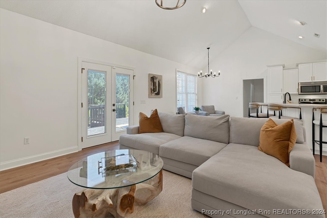 512 Maple Leaf Way Lumberton, NC 28358 - Photo 31 of 50 a living room with furniture and a wooden floor