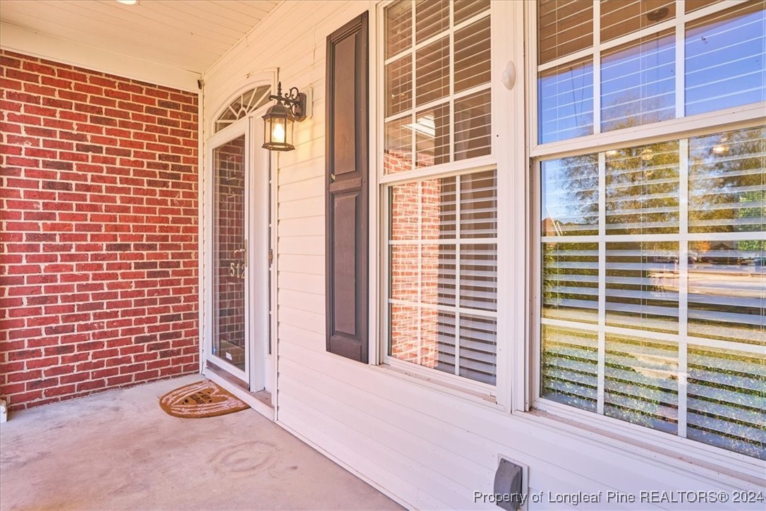 512 Maple Leaf Way Lumberton, NC 28358 - Photo 4 of 50 a view of porch with a floor to ceiling window and floor