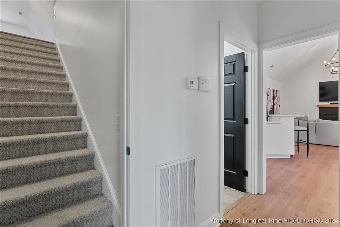 512 Maple Leaf Way Lumberton, NC 28358 - Photo 41 of 50 a view of entryway and hall with wooden floor