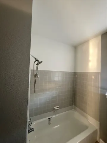 a bathroom with a bathtub