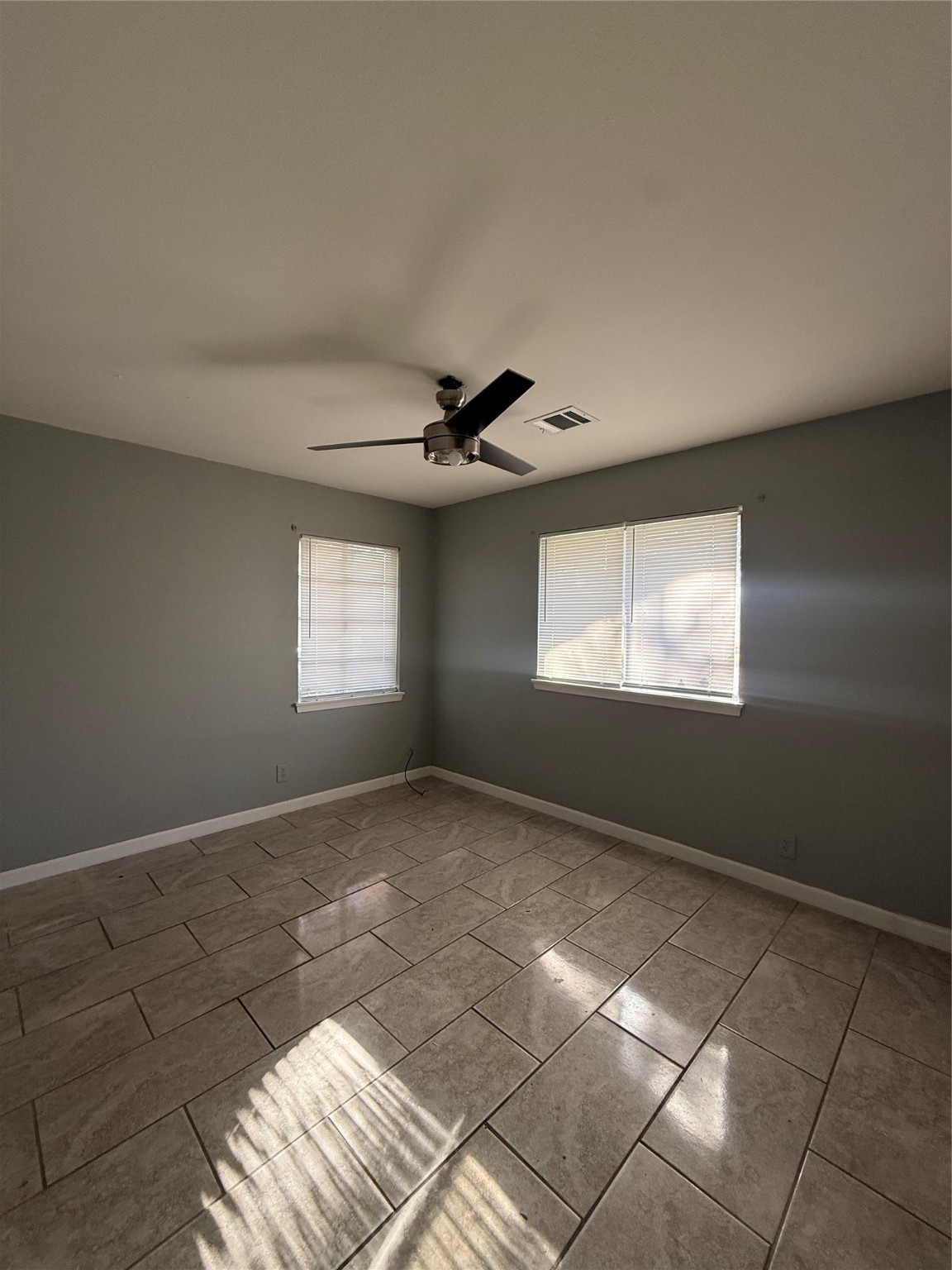 9526 Hammerly Boulevard Houston, TX 77080 - Photo 12 of 16 a view of an empty room with a window