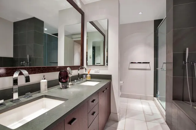 a kitchen with stainless steel appliances granite countertop a sink stove and microwave