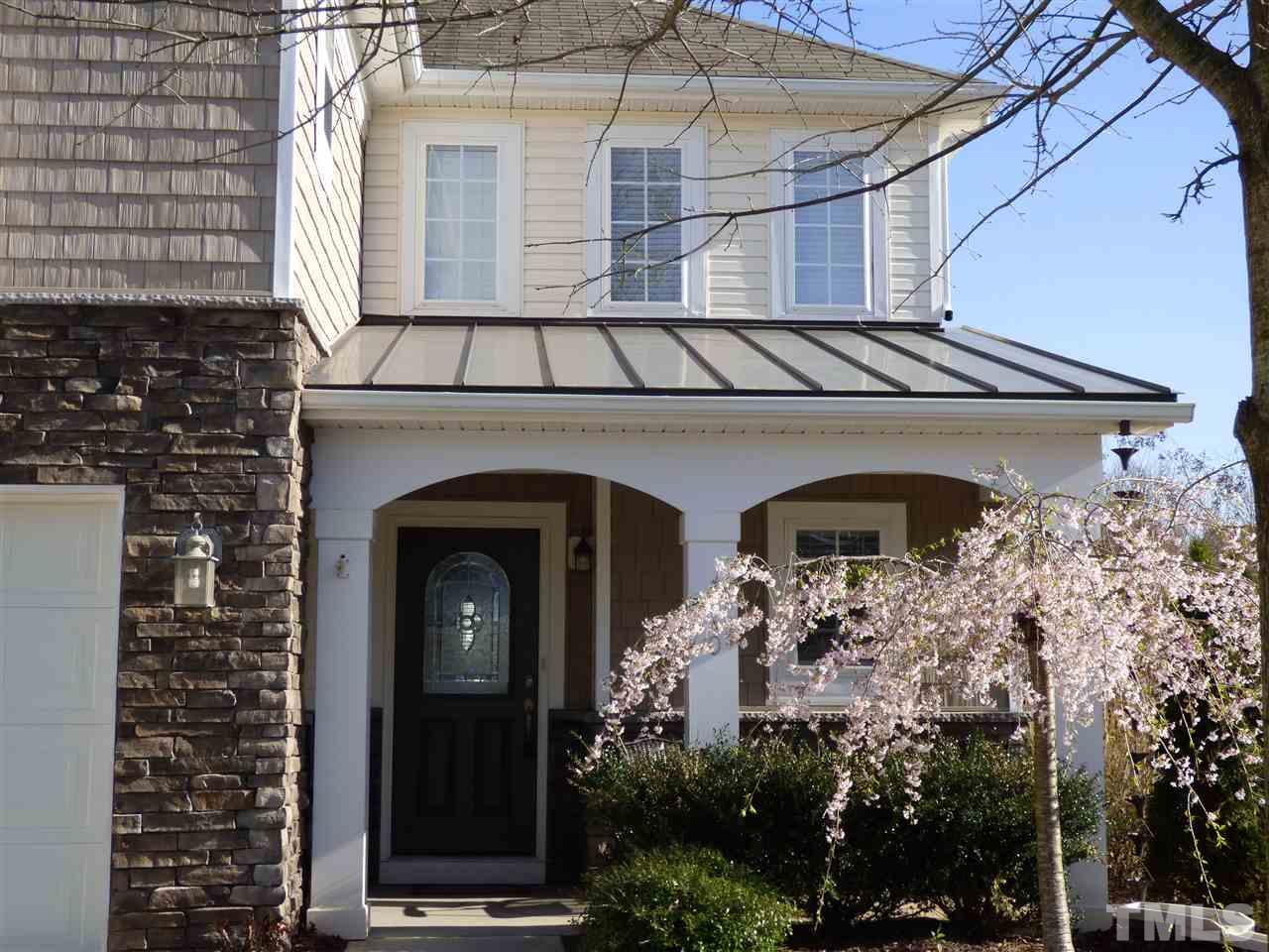 170 Ryder Cup Circle Raleigh, NC 27603 - Photo 3 of 23 a front view of a house with glass windows