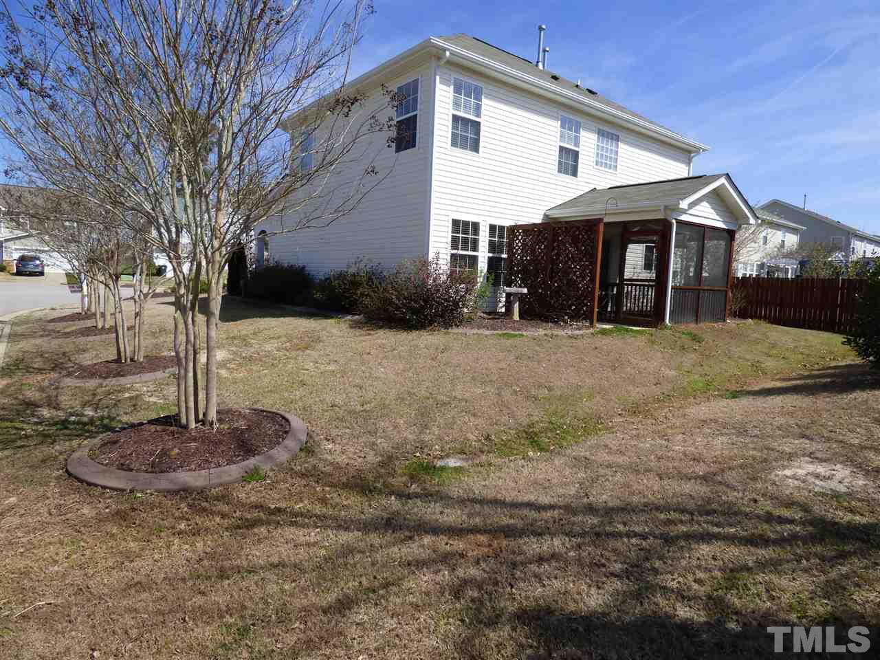 170 Ryder Cup Circle Raleigh, NC 27603 - Photo 22 of 23 a front view of a house with a yard