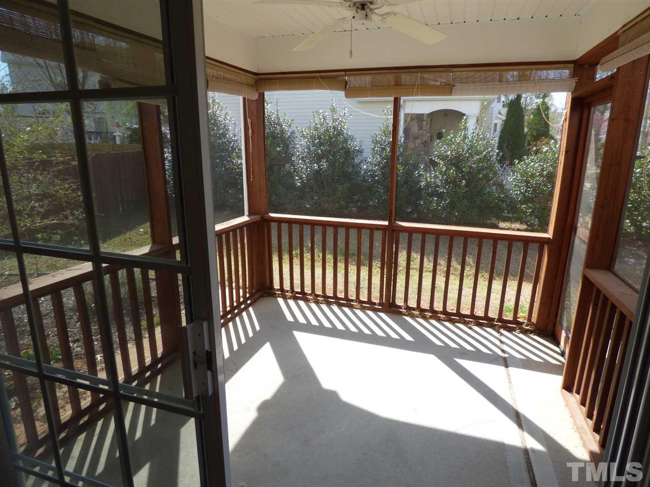 170 Ryder Cup Circle Raleigh, NC 27603 - Photo 10 of 23 a view of a balcony with floor to ceiling window wooden floor