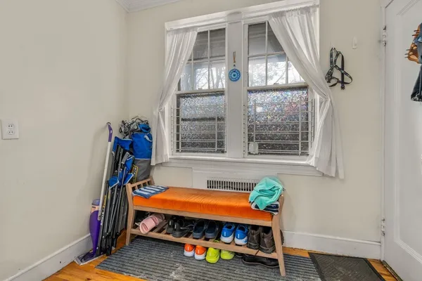 a room with window and wooden floor