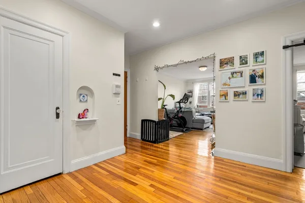 a view of a livingroom with furniture and wooden floor