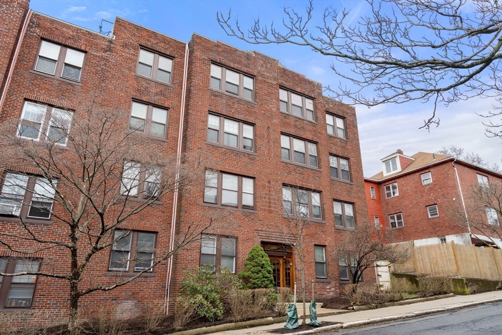 285 Corey Road, Unit 4 Boston, MA 02135 - Photo 22 of 26 a front view of a building