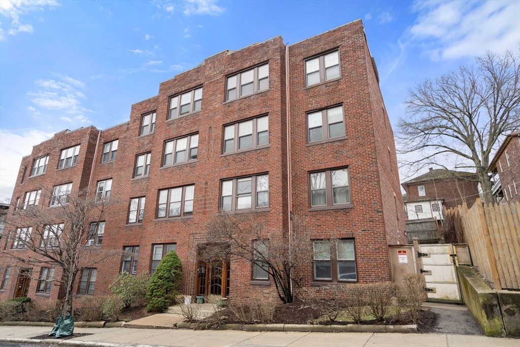 285 Corey Road, Unit 4 Boston, MA 02135 - Photo 24 of 26 a front view of a building