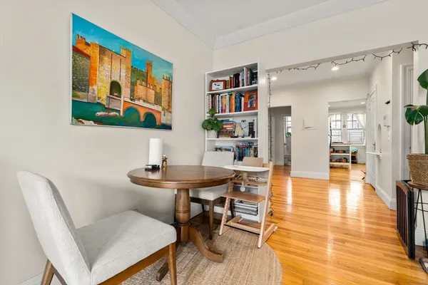 a workspace with furniture and wooden floor