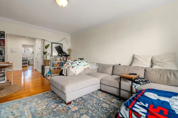 a living room with furniture and a couch