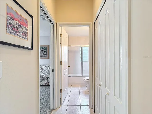 a living room with furniture and a garden