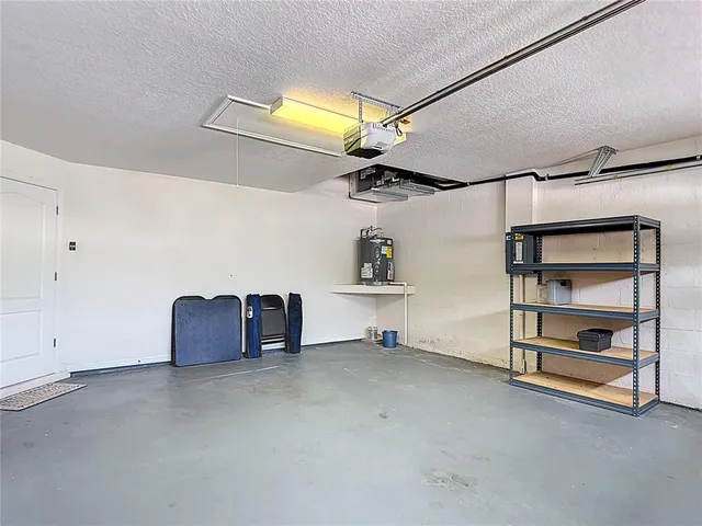 an aerial view of a house with a ocean view
