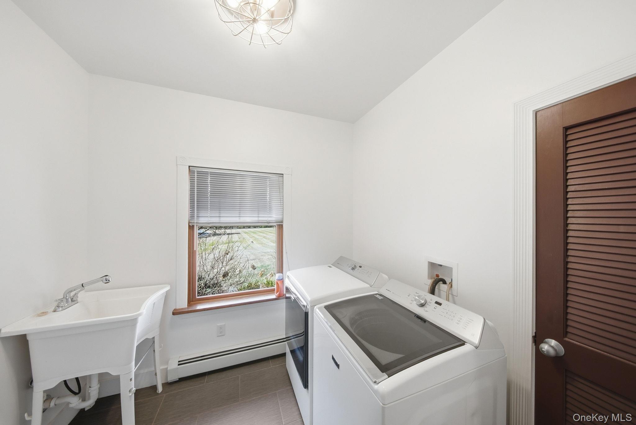 58 Deer Meadow Road White Lake, NY 12786 - Photo 11 of 50 a bathroom with a sink and a window