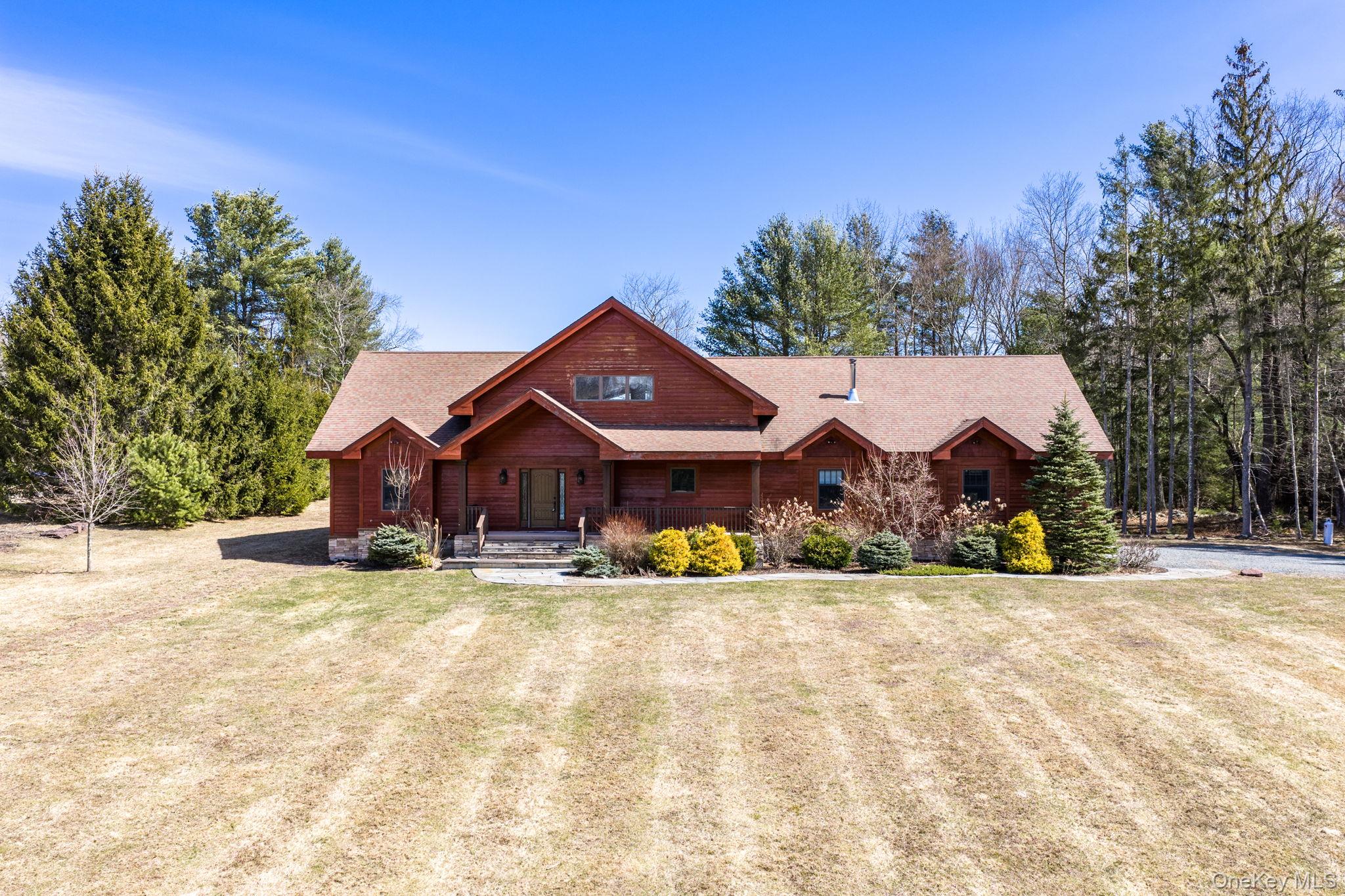 58 Deer Meadow Road White Lake, NY 12786 - Photo 2 of 50 a view of a house with a yard and large trees