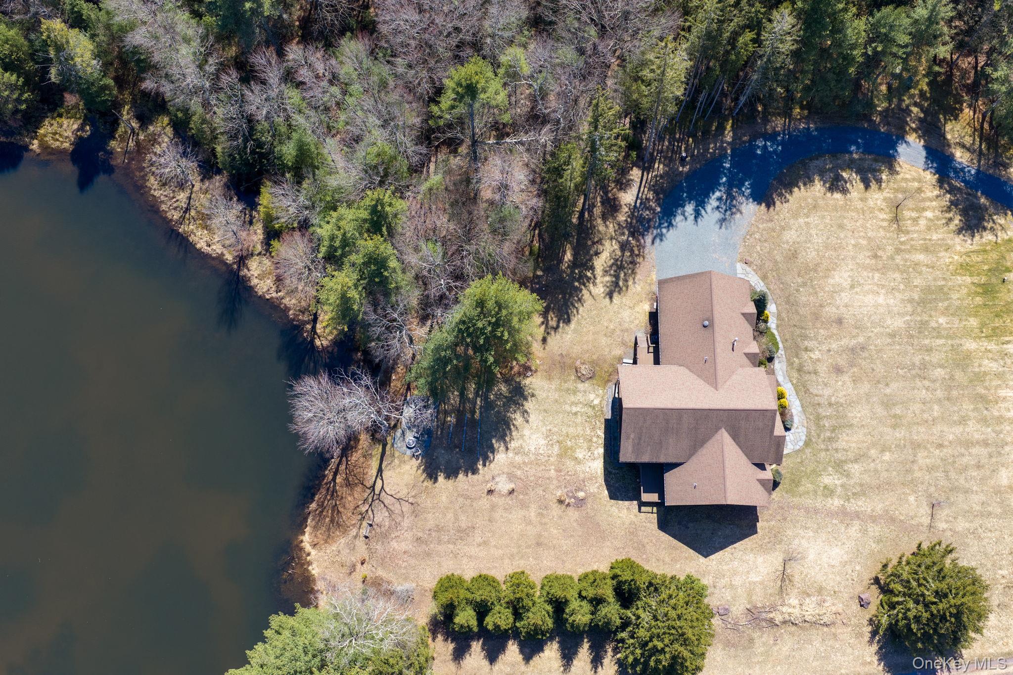 58 Deer Meadow Road White Lake, NY 12786 - Photo 34 of 50 an aerial view of residential house with outdoor space and trees all around