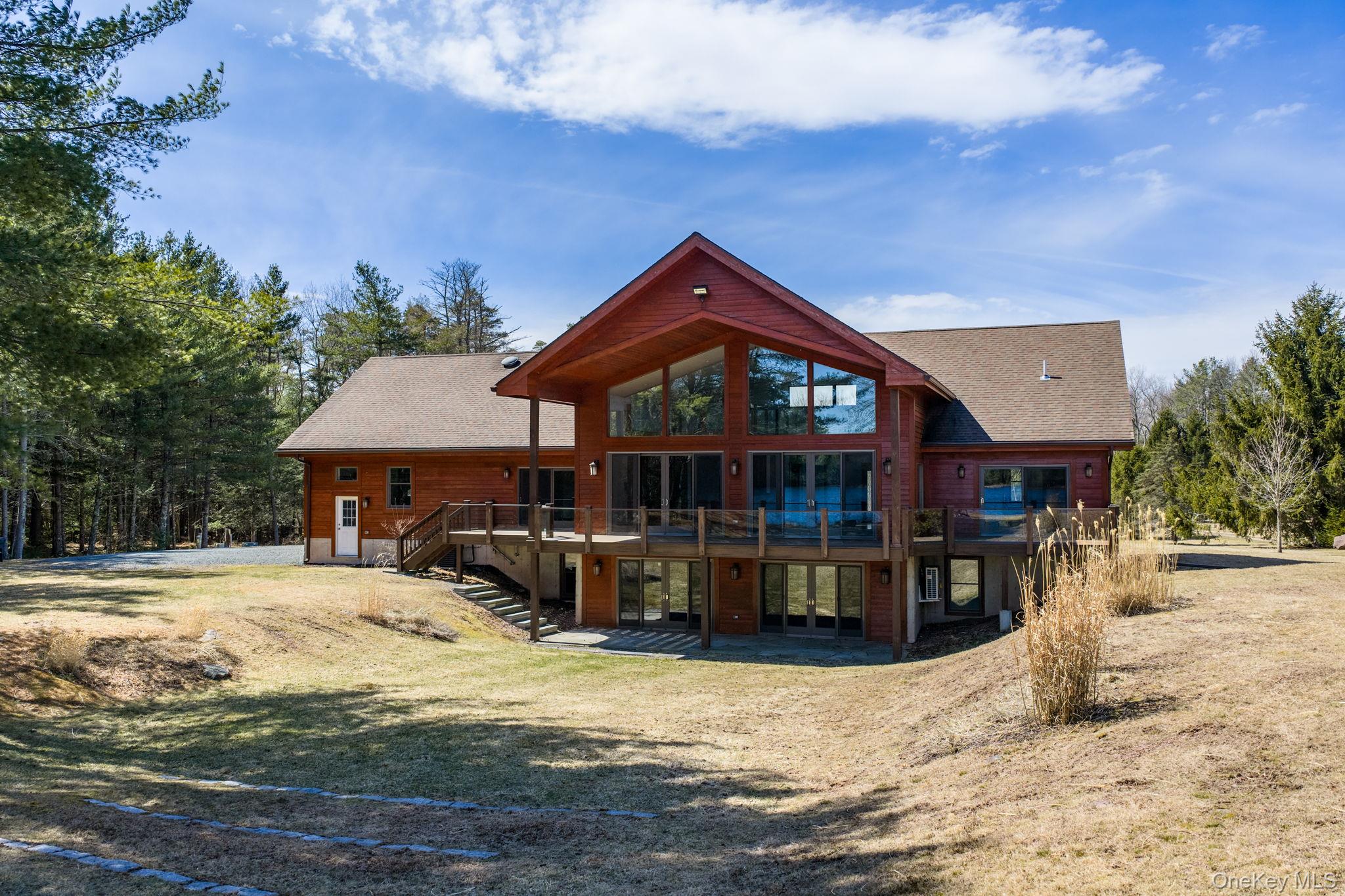 58 Deer Meadow Road White Lake, NY 12786 - Photo 38 of 50 a front view of a house with a yard outdoor seating and barbeque oven