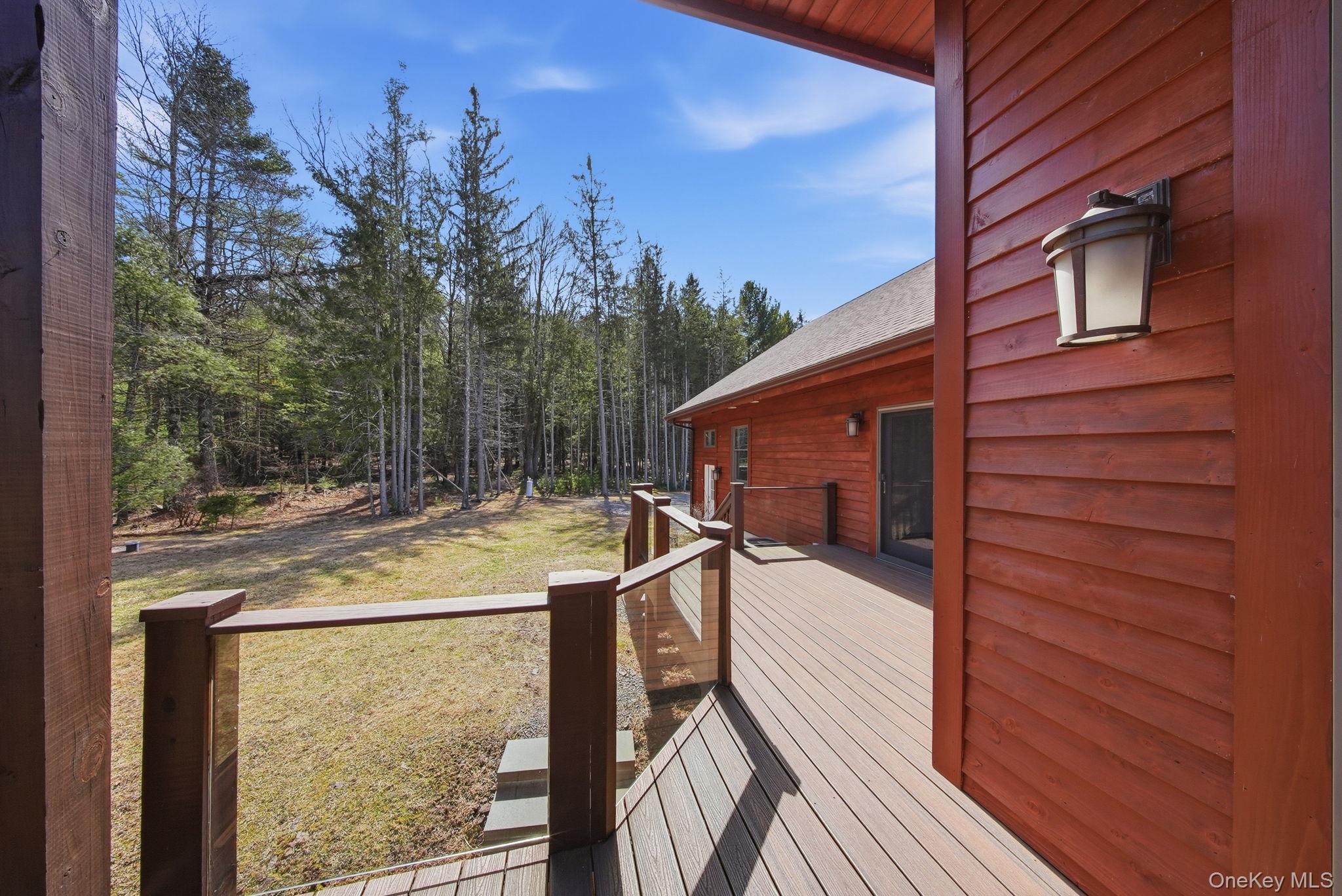 58 Deer Meadow Road White Lake, NY 12786 - Photo 47 of 50 a view of a balcony with wooden floor and fence