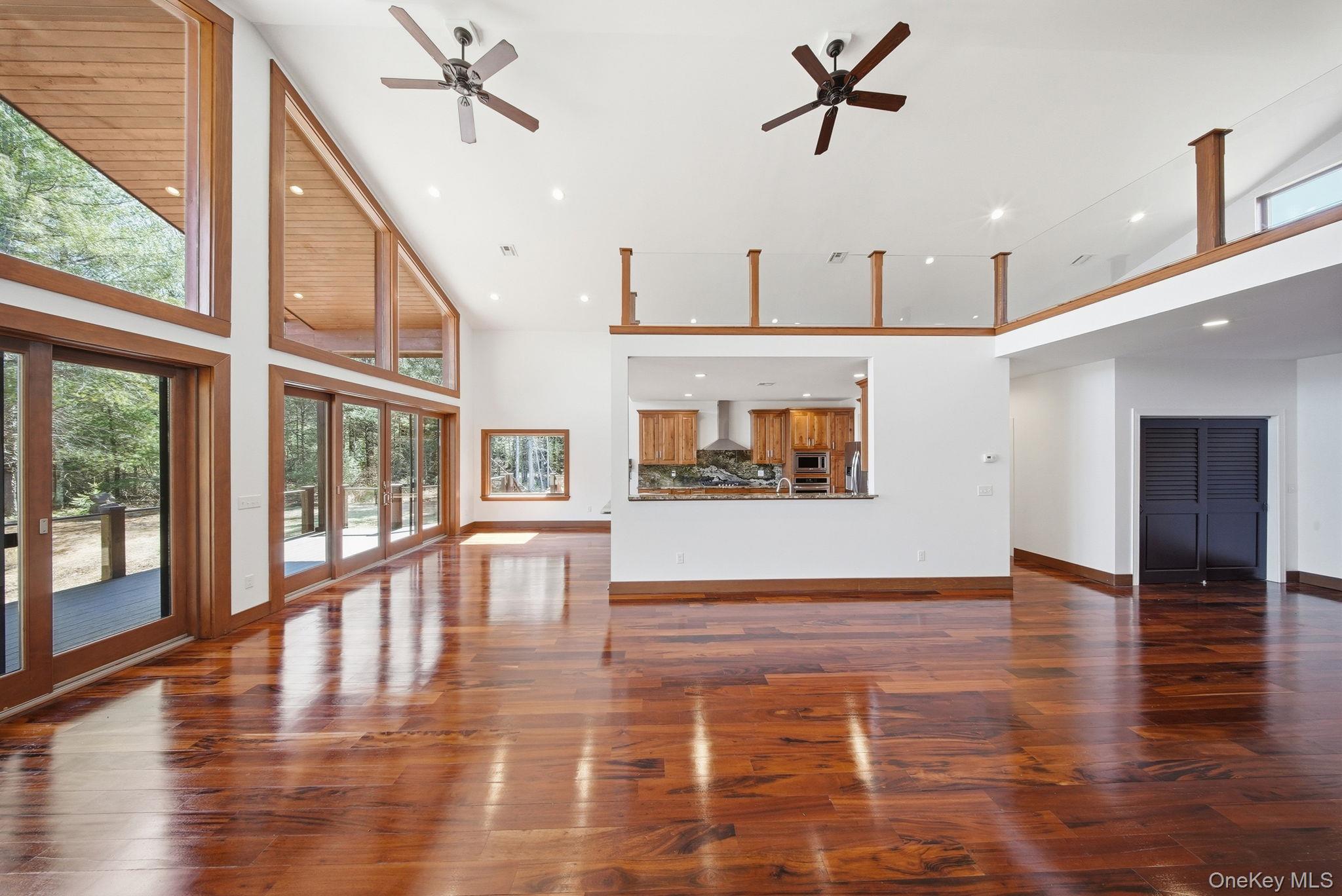 58 Deer Meadow Road White Lake, NY 12786 - Photo 10 of 50 a view of an entryway with wooden floor a ceiling fan and windows