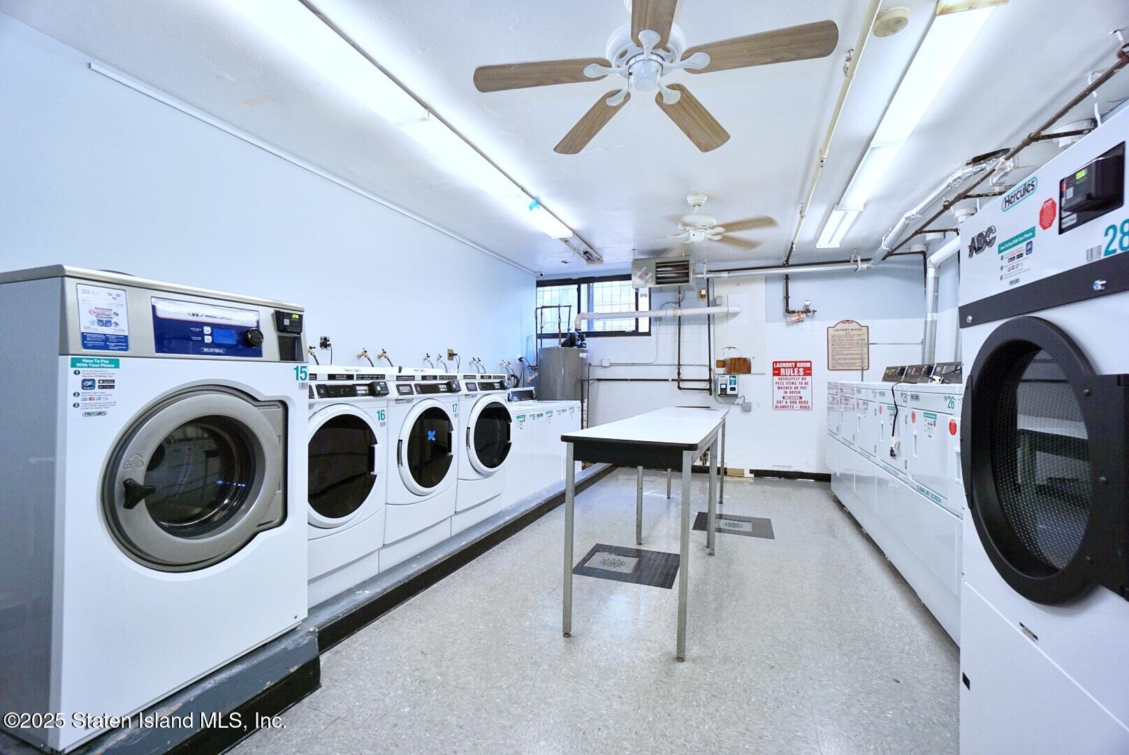 11 Windham Loop, Unit 3II Staten Island, NY 10314 - Photo 17 of 18 a utility room with dryer and washer