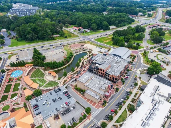 an aerial view of a house with a garden