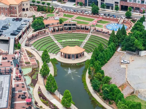 an aerial view of a swimming pool and outdoor space