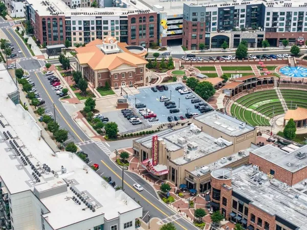 aerial view of a city with lots of green space