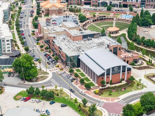 an aerial view of a house with a garden
