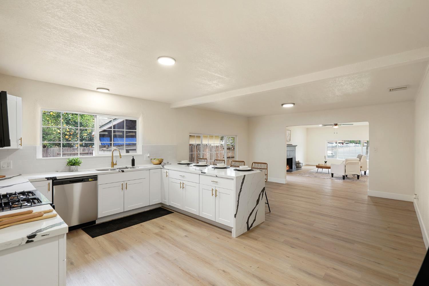 1417 Concord Avenue Modesto, CA 95350 - Photo 14 of 40 a kitchen with stove and cabinets