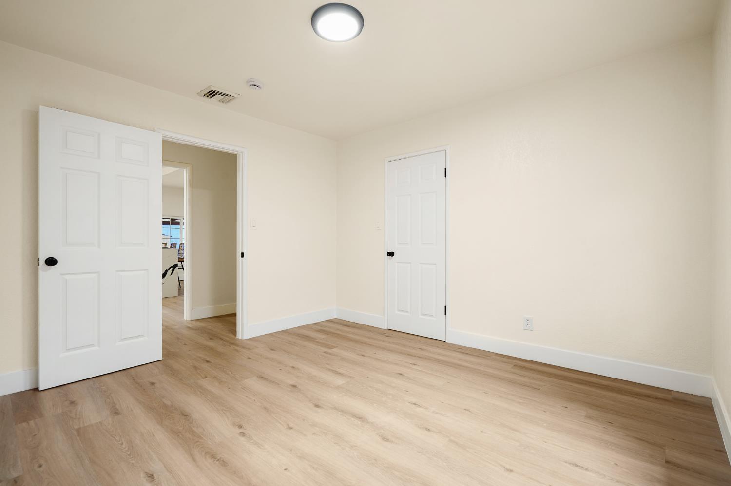 1417 Concord Avenue Modesto, CA 95350 - Photo 26 of 40 wooden floor in an empty room
