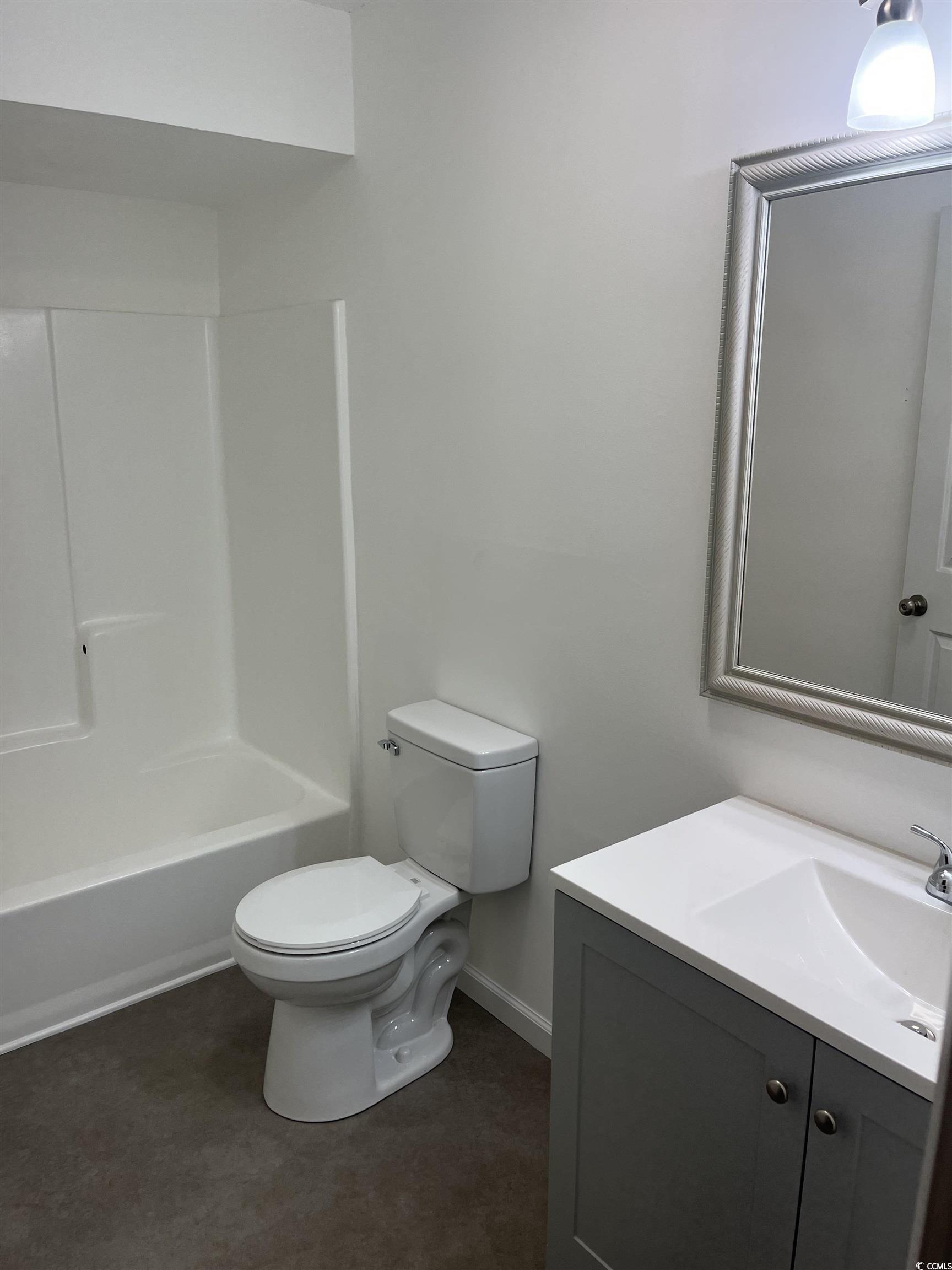 600 65th Avenue North, Unit 7 Myrtle Beach, SC 29572 - Photo 23 of 29 Bathroom featuring vanity and shower / bathtub combination
