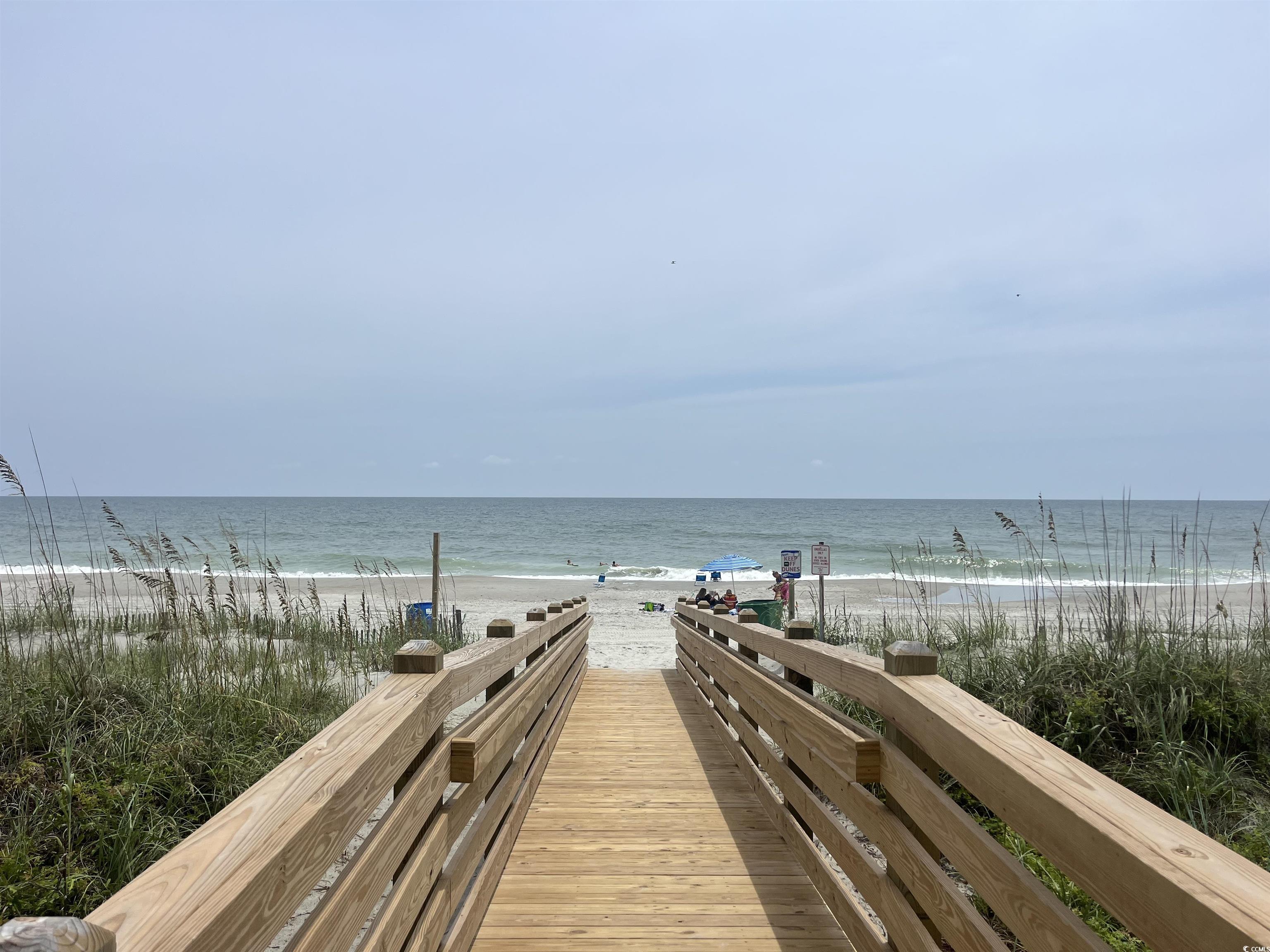 600 65th Avenue North, Unit 7 Myrtle Beach, SC 29572 - Photo 29 of 29 View of home's community featuring view of water and beach