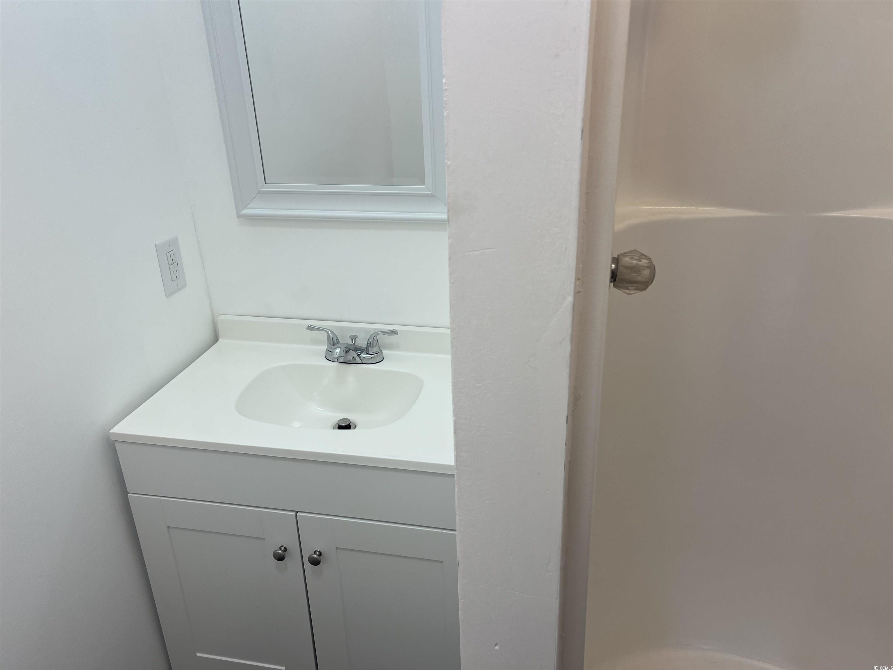 600 65th Avenue North, Unit 7 Myrtle Beach, SC 29572 - Photo 10 of 29 Bathroom featuring vanity