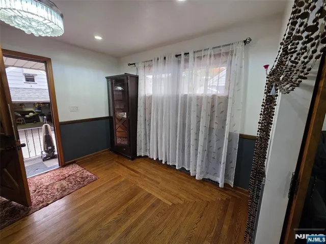 a view of a hallway with staircase