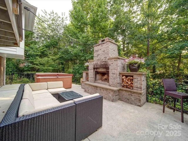 a terrace of a house with outdoor seating