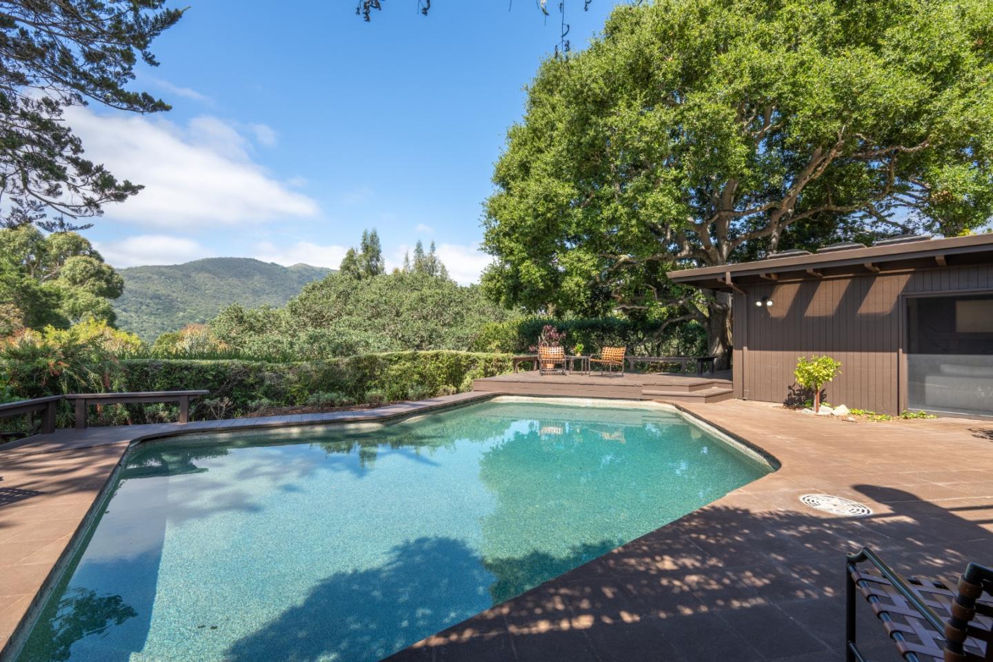46 Middle Canyon Road Carmel Valley, CA 93924 - Photo 43 of 74 a view of a swimming pool with a yard